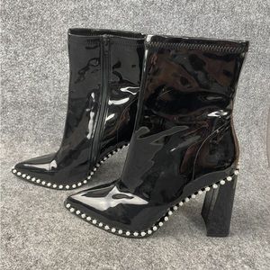 Black patent leather women’s ankle boots. Brand new